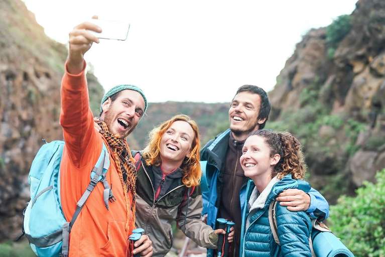 group of friends exploring the mountains in colorado